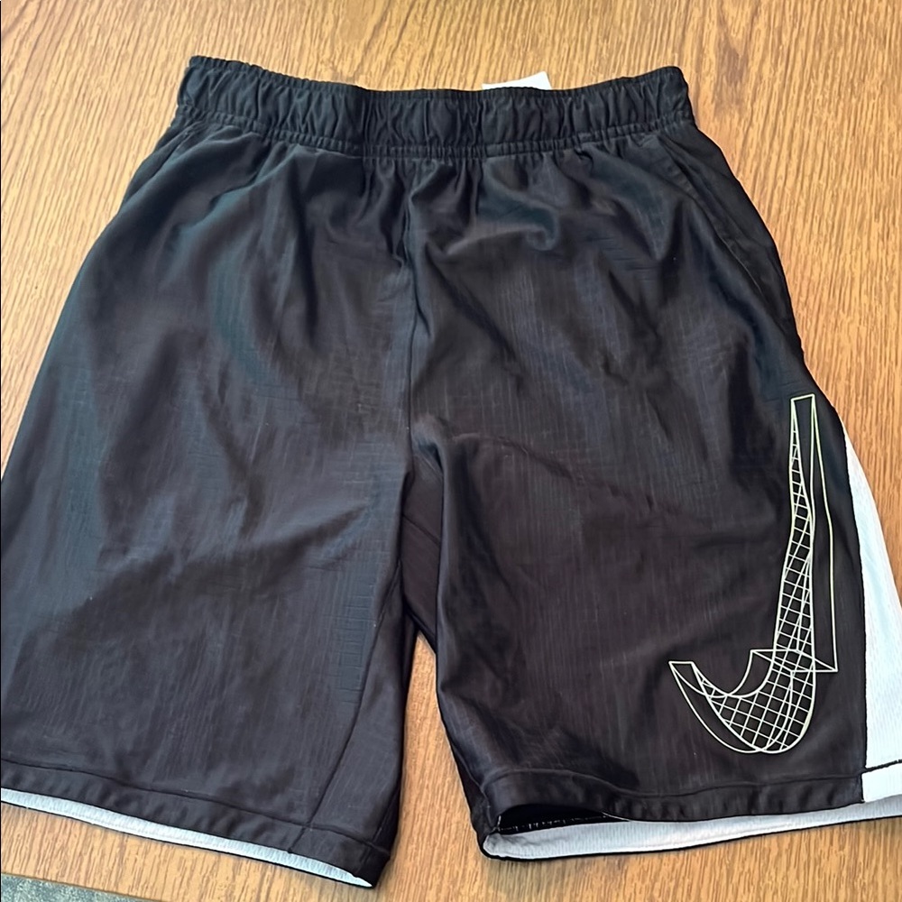 Boys black Nike athletic shorts